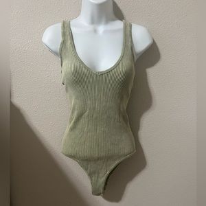 Green ribbed spandex bodysuit